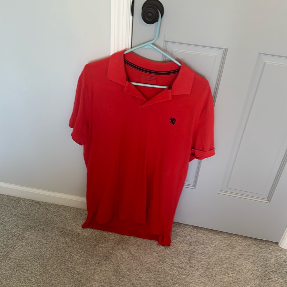 Red men’s Express polo size XL